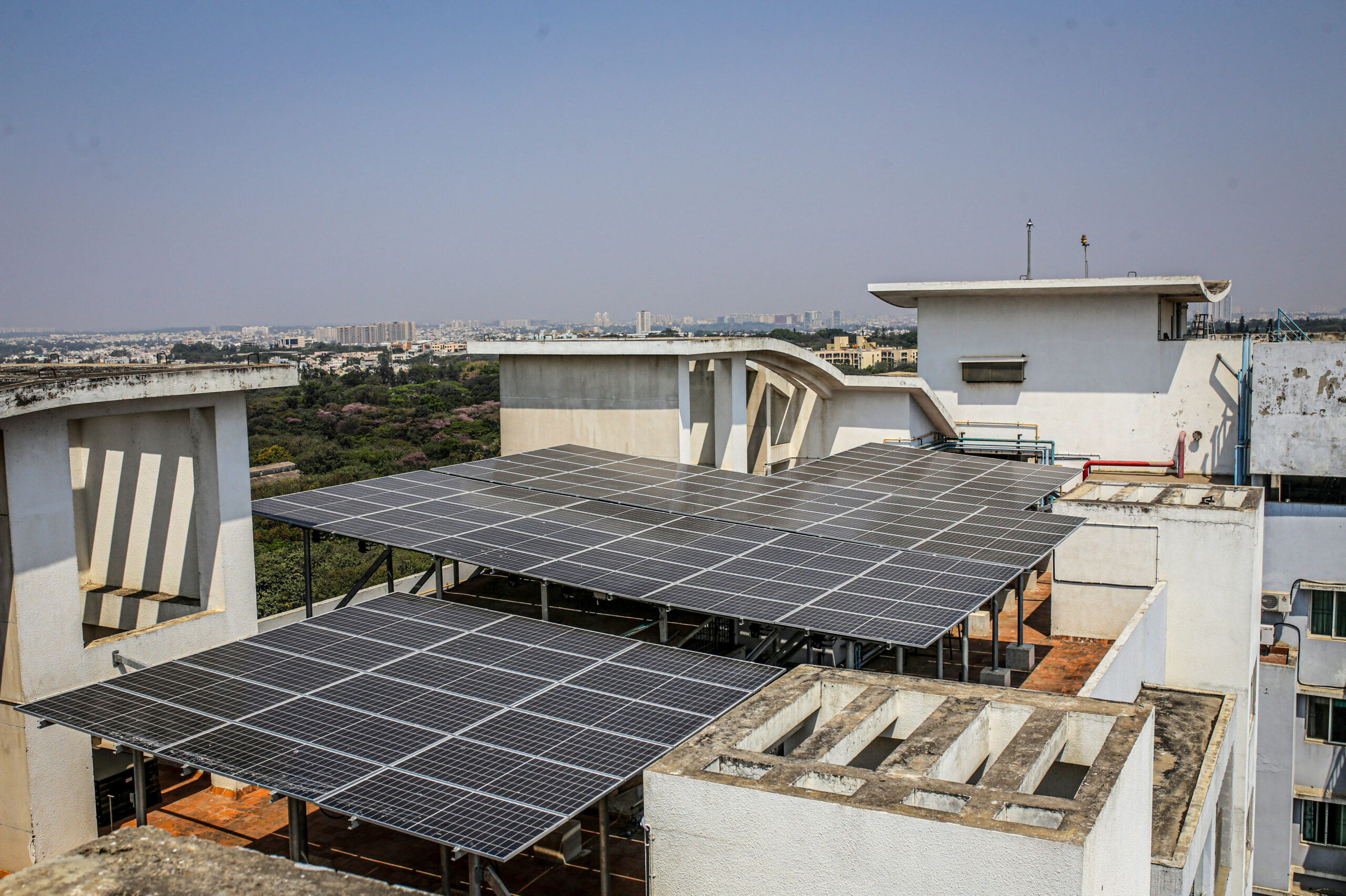 service-1 rooftop solar farm atop a residential building in bengaluru